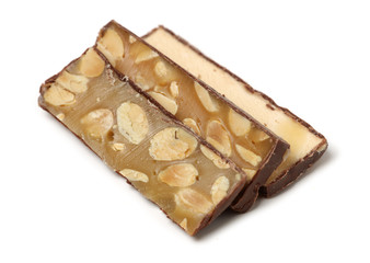 Chocolate peanut candy on white background