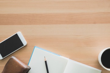 Working space. new jobs concept Top view of a businessman on a wooden desk..