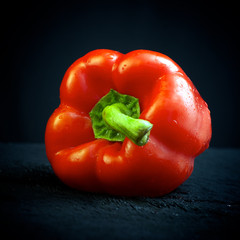 Red pepper on black