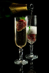Golden champagne with strawberries
