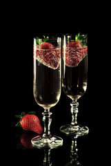 Golden champagne with strawberries
