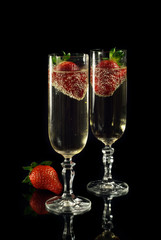 Golden champagne with strawberries