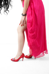 Closeup shot of young woman's legs in fashionable high heel