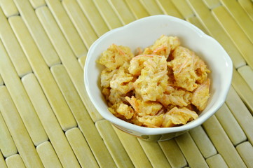 salty fried crispy shrimp head with flour on cup