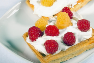 Homemade waffles with fresh raspberrries