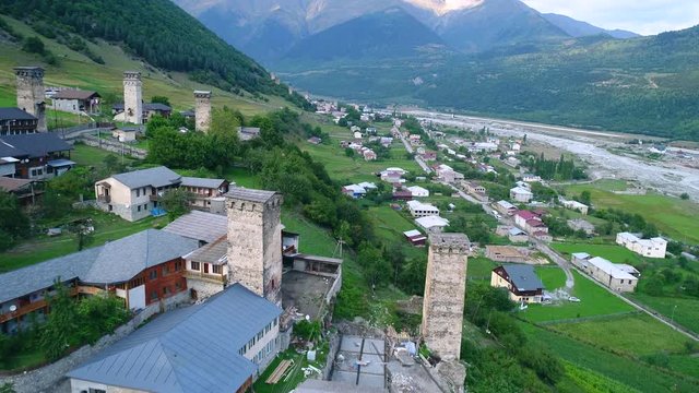 Aerial footage in Mestia v04, Georgia. Ancient historical Svaneti towers among dwelling houses