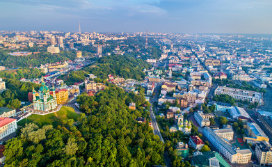 Aerial view of Saint Andrew church and Andriyivskyy Descent, cityscape of Podil. Kiev, Ukraine