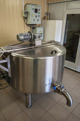 Cheese production at dairy farm, first stage - milk processing