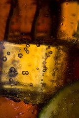 Close up cuba libre. Cocktail with rum, lime and ice on white background

