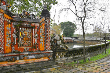 A gear screen and lake in the grounds in Truong Sanh Residence in the Imperial City, Hue, Vietnam
