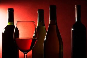 Red Wine Glass and Bottles