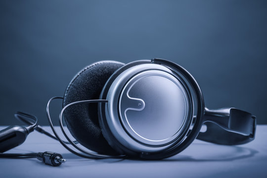headphones on a gray-blue background