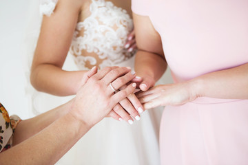 Bride with mother wedding hand. wedding blessing of the bride morning of the bride hand of the bride and mother