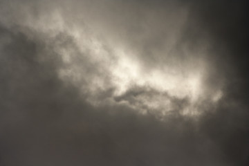 Gray rain clouds. Dark stormy sky background