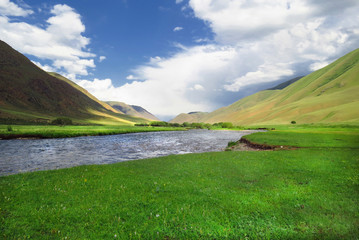 Fototapeta premium Beautiful landscape in Kyrgyzstan, river, mountains