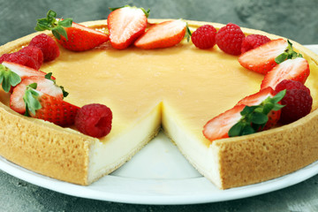 Homemade cheesecake with fresh berries for dessert. Cheese cake