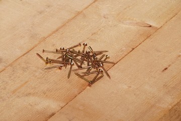 Phillips screws on a wooden floor