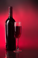 Bottle of Red Wine and Glass