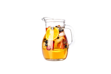 Pitcher of drink with fruits.