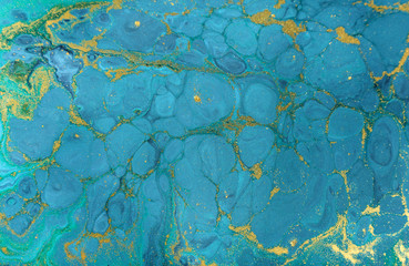 Marble abstract acrylic background. Nature blue marbling artwork texture. Golden glitter.
