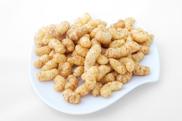 Peanut crisps on plate