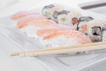 Tasteful frozen sushi with ginger and wasabi
