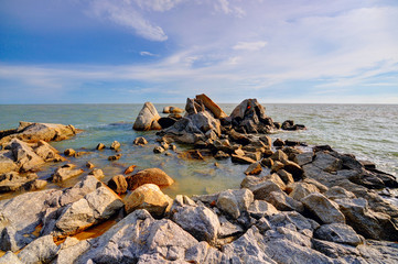 Fototapeta na wymiar Large rocks on the coast of Malaysia