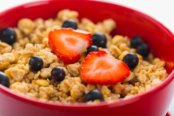 Bowl of Granola, Blueberries and Strawberries