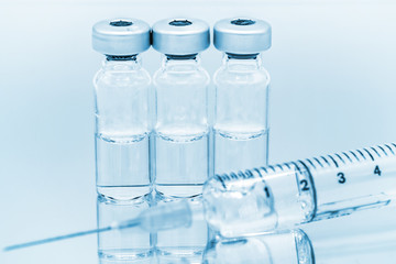 Vaccine with hypodermic syringe and needle