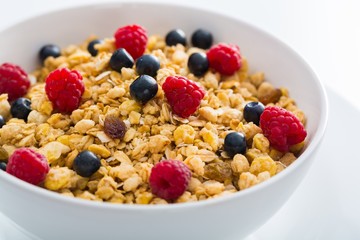 Bowl of Granola, Blueberries and Raspberries