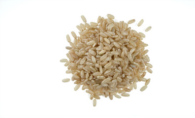 Handful of white unpeeled rice isolated on white background. One of the varieties of rice.