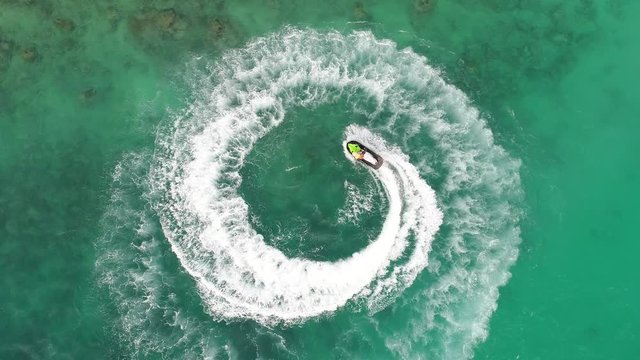 Video People are playing jet ski at sea during the holidays. 