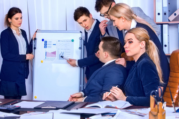 Fototapeta premium Business people office life of team people working with papers sitting table. Schemas and diagrams on presentation and demonstration. Firm is considering proposed contract.