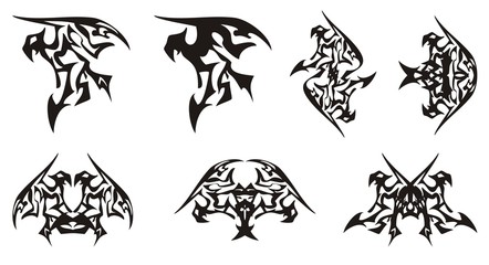 Tribal eagle symbols in the dragon form. Eagle symbol, similar to a dragon and the double peaked symbols formed from him on a white background for your design