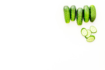 Greeny cocktail ingredients. Fitness smoothie. Cucumber on white background top view space for text