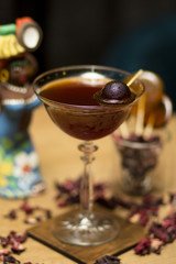  dark cocktail with decorations on the table