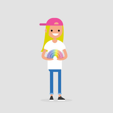Young female character playing with a rainbow spring toy / flat editable vector illustration, clip art