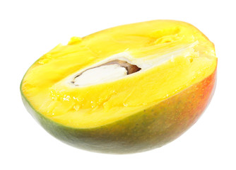 Ripe yellow mango fruit cut in half inside longitudinal section isolated on white background