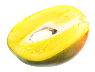 Ripe yellow mango fruit cut in half inside longitudinal section isolated on white background