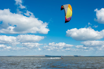 A man riding kite - kite surfing