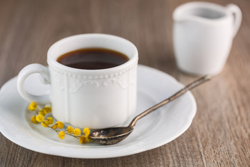 One white ceramic cup of coffee