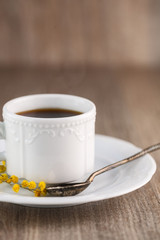 One white ceramic cup of coffee