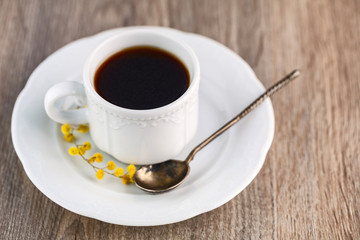 One white ceramic cup of coffee
