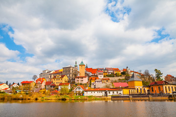 Bright small town Loket the near of Karlovy Vary, Czech Republic. Summer day and waterfront view.