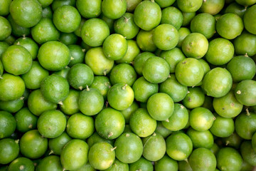 Fresh Limes or Limons for sale at Sunday Market in Ecuador