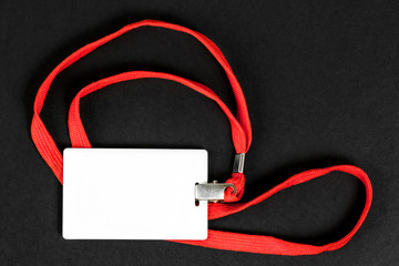 Empty card ID / icon with an orange belt on a black background. Space for text