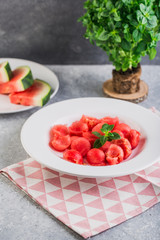 Healthy fresh organic watermelon salad with basil closeup