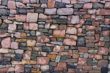 Seamless stone masonry using rectangular stones, red and gray shades