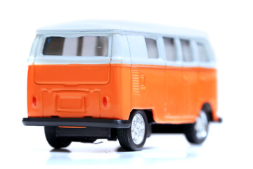 Small dicast car model on white background
