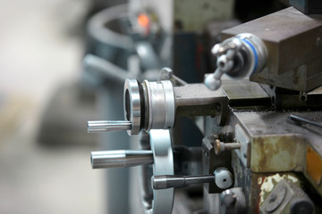 Close up shot of lathe machine controls
